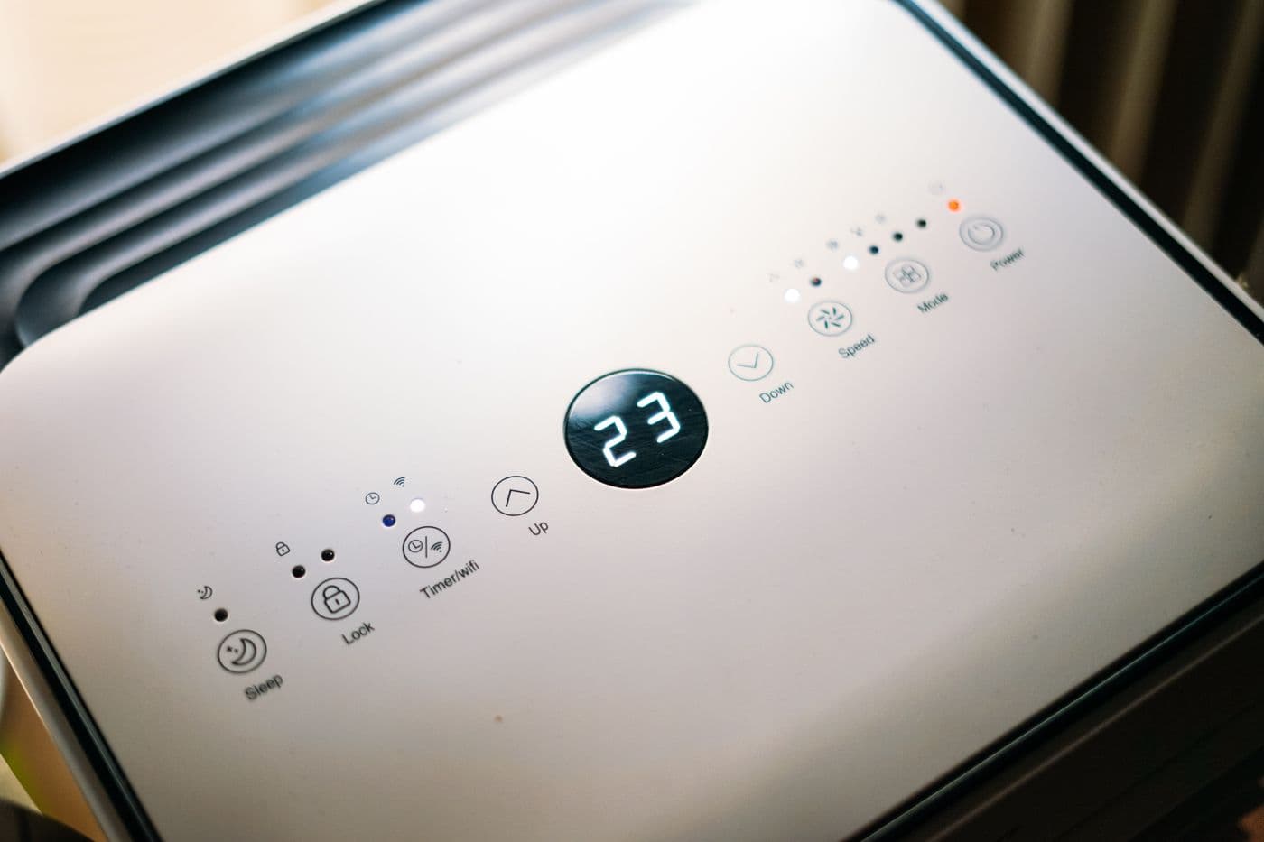 A dehumidifier control panel running to dry out a structure